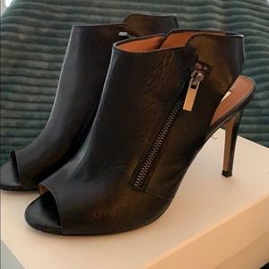 Peep toe sling back black booties. Size 9.5M